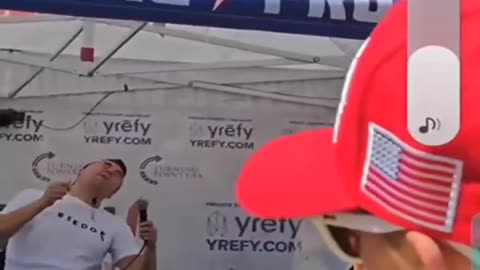 A close-up shows the moment Charlie Kirk was shot.