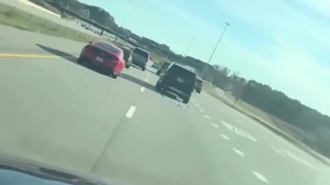 DHS agents shoot pepper balls at multiple cars tailing them in an aggressive manner