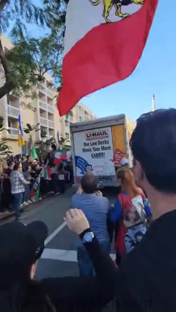 U-HAUL truck plows through a massive Iran, protest