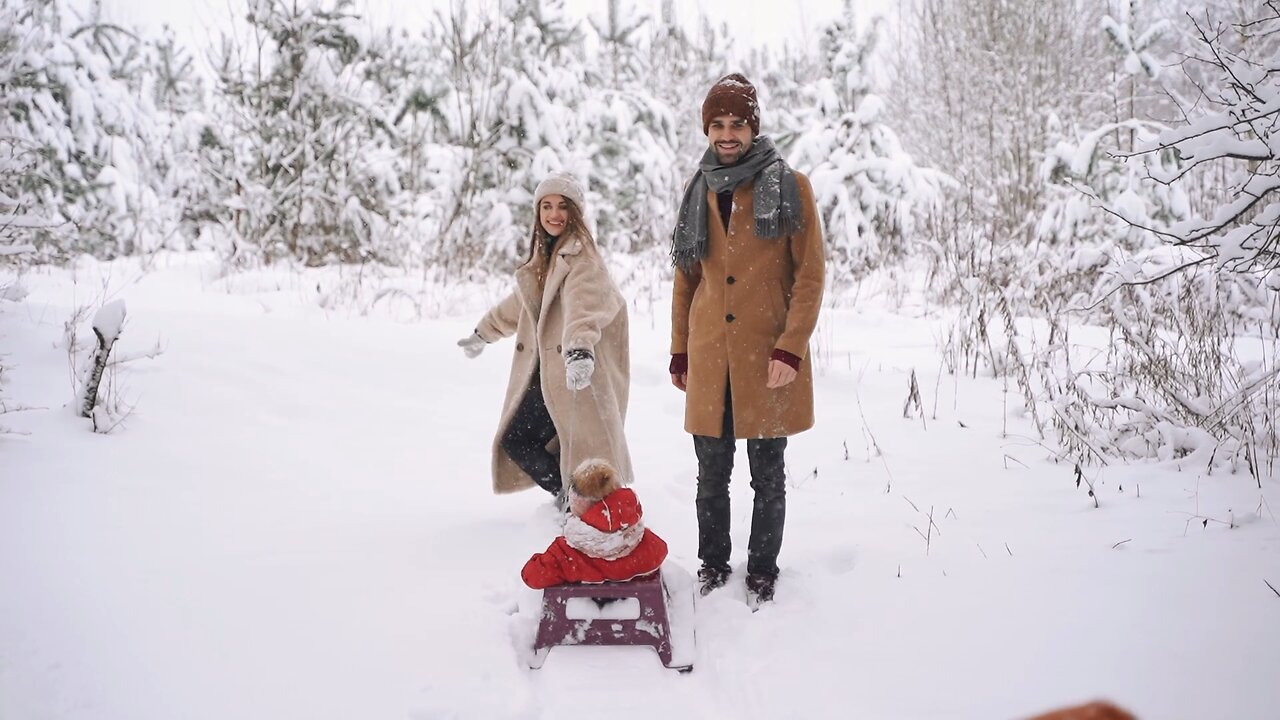 Having SNOW Much Fun Sledding