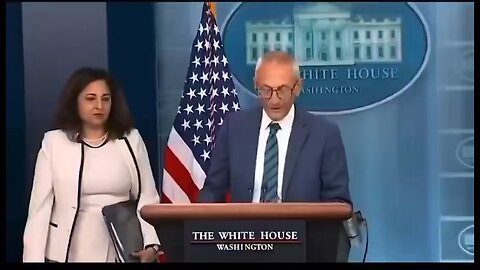 Pizza-man John Podesta — standing next to the Democratic-selected acting president