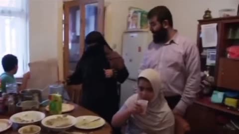 Mohammed lives in UK, has three wives, eleven children, and doesn't work.