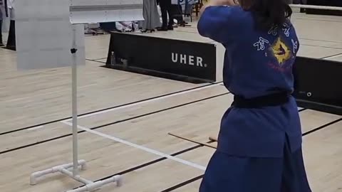 🤯💪 Watch Her Slice Paper Like a Pro with a Wooden Sword! | FeedMyCuriosity
