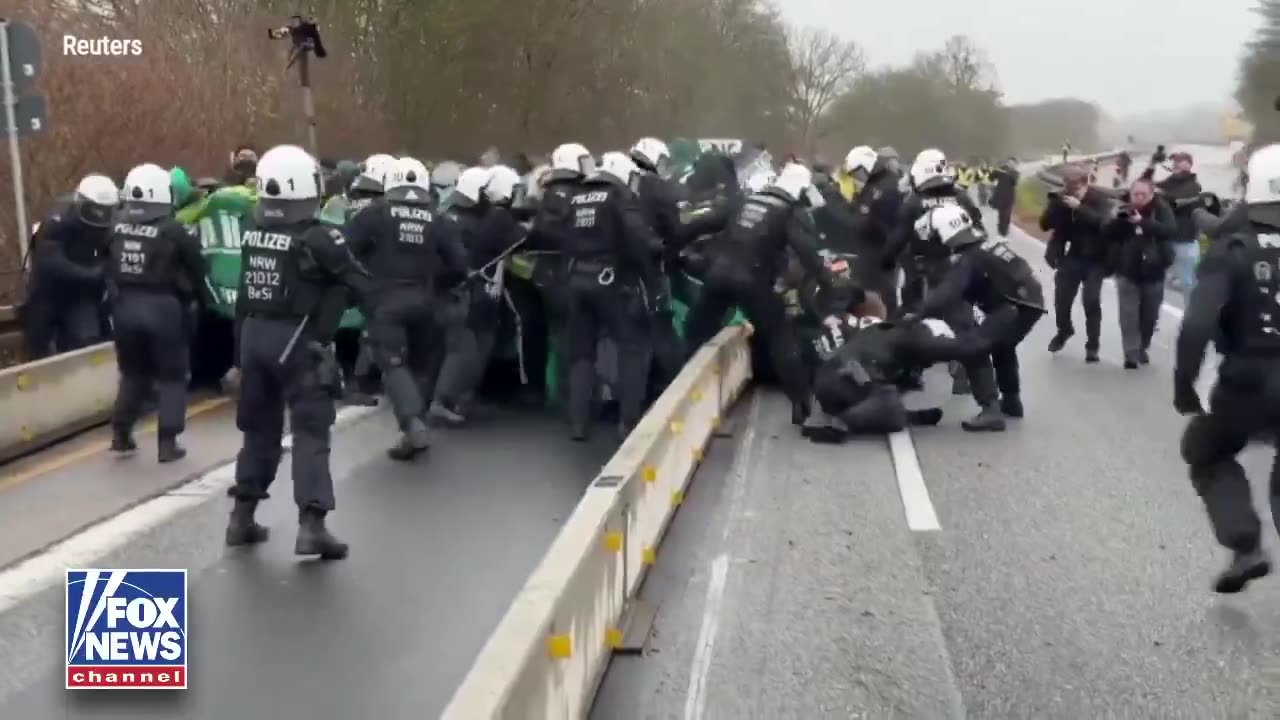 German police dispersed a crowd of 25,000–30,000 protesters, including Antifa activists,