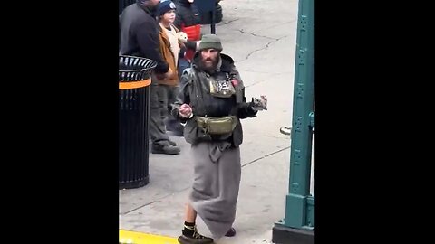 People stroll past Wild-looking Man Brandishing a Knife like it's normal - only in New York