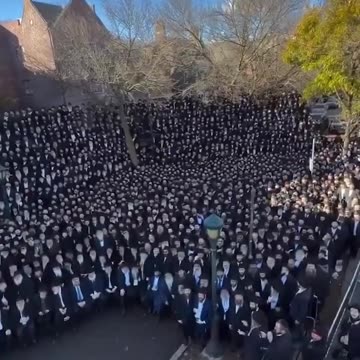 In front of the facade of the Chabad-Lubavitch movement...