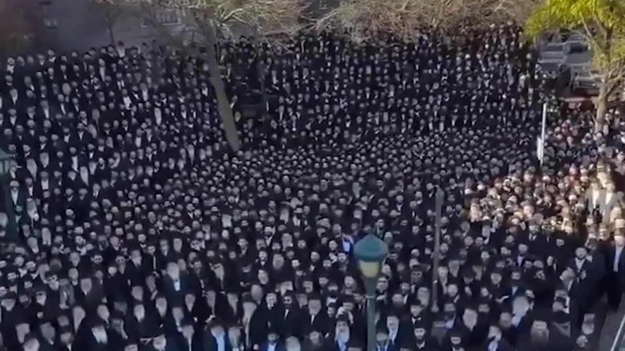 In front of the facade of the Chabad-Lubavitch movement...