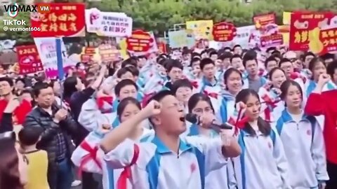 Young Chinese Dude Seems Extra-Nervous At The Protest LOL