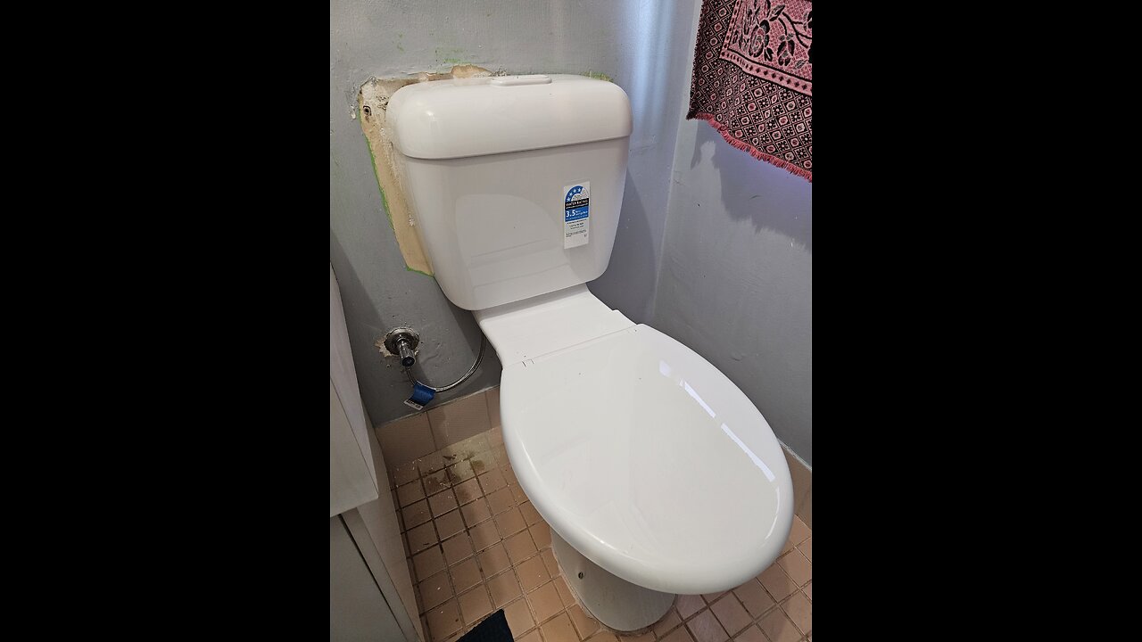 Base toilet cistern installed.