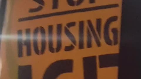 NYPD cops arresting migrant protectors.