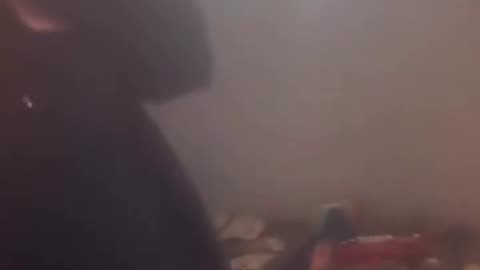 A Haitian woman explains to CPS that her home is not in poor conditions.