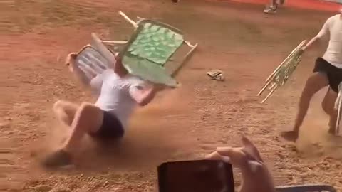 He Secured the Best Seat With a Flip and Two Chairs