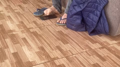 Dad Scrolls With His Toe