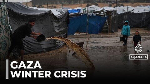 Storm worsens living conditions: A families dig trenches to keep water out of tents