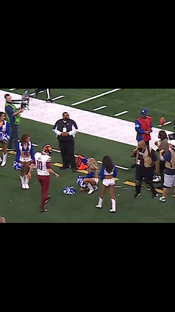 Dallas Cowboy Cheerleader Gets Nailed In The Head By Football