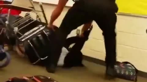 Cop body slams and drags a female student