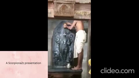 Hot water bath being performed on the idol..a naration in telugu...