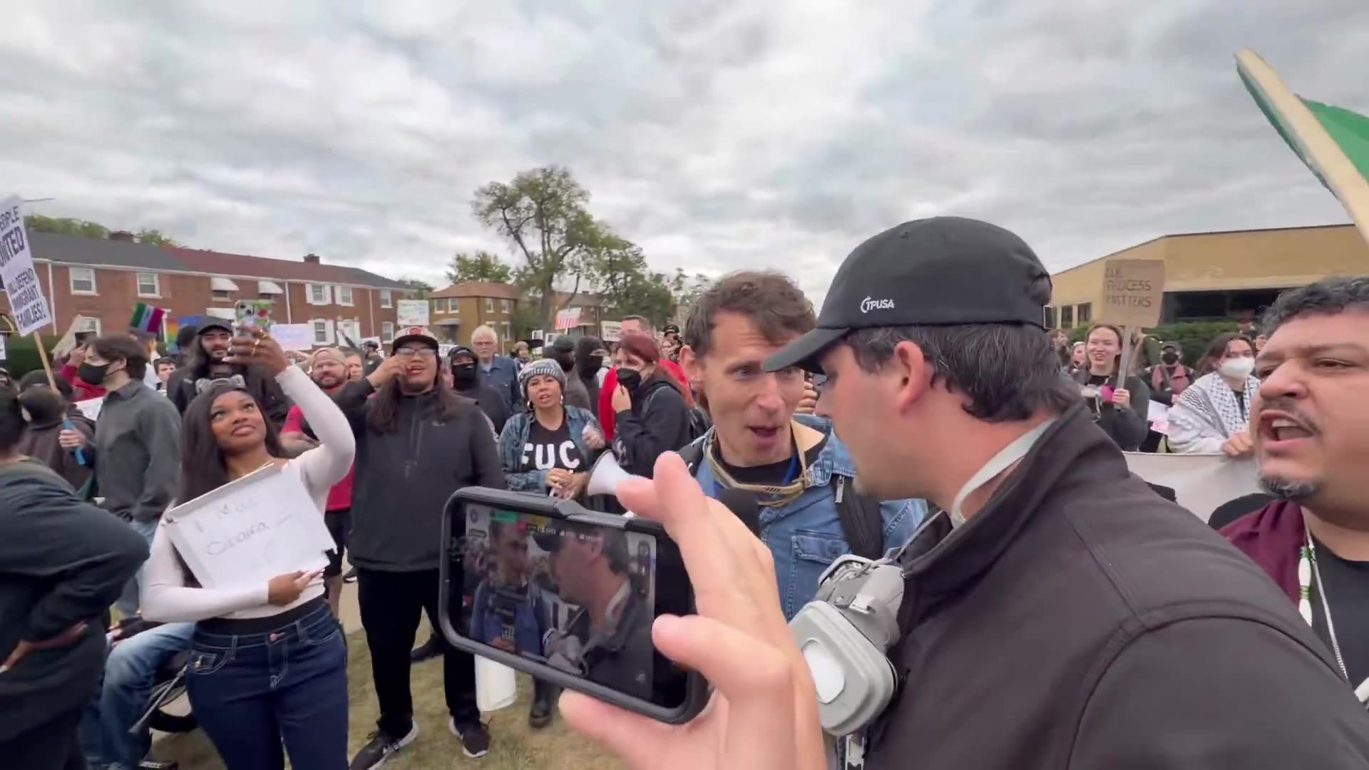 Leftists Chant Temu Charlie Kirk at Cam Higby While an Unhinged Woman Does Finger Guns at His Neck