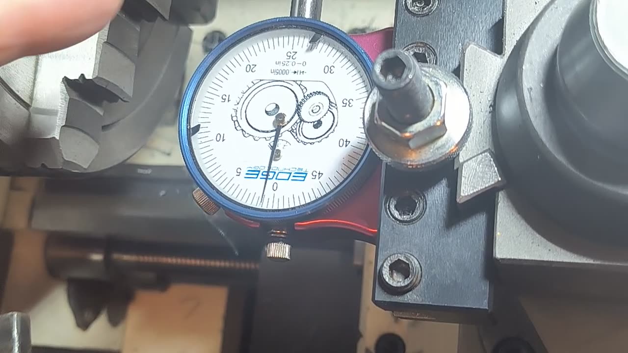 Dial in the workpiece in an independent 4 jaw chuck.