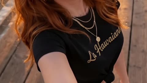 Sunset vibes hit different in this tee… guess where I’m headed next? #beachstyle #summerfit