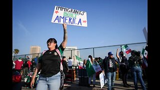 Marchers protesting planned deportations block major freeway in Los Angeles