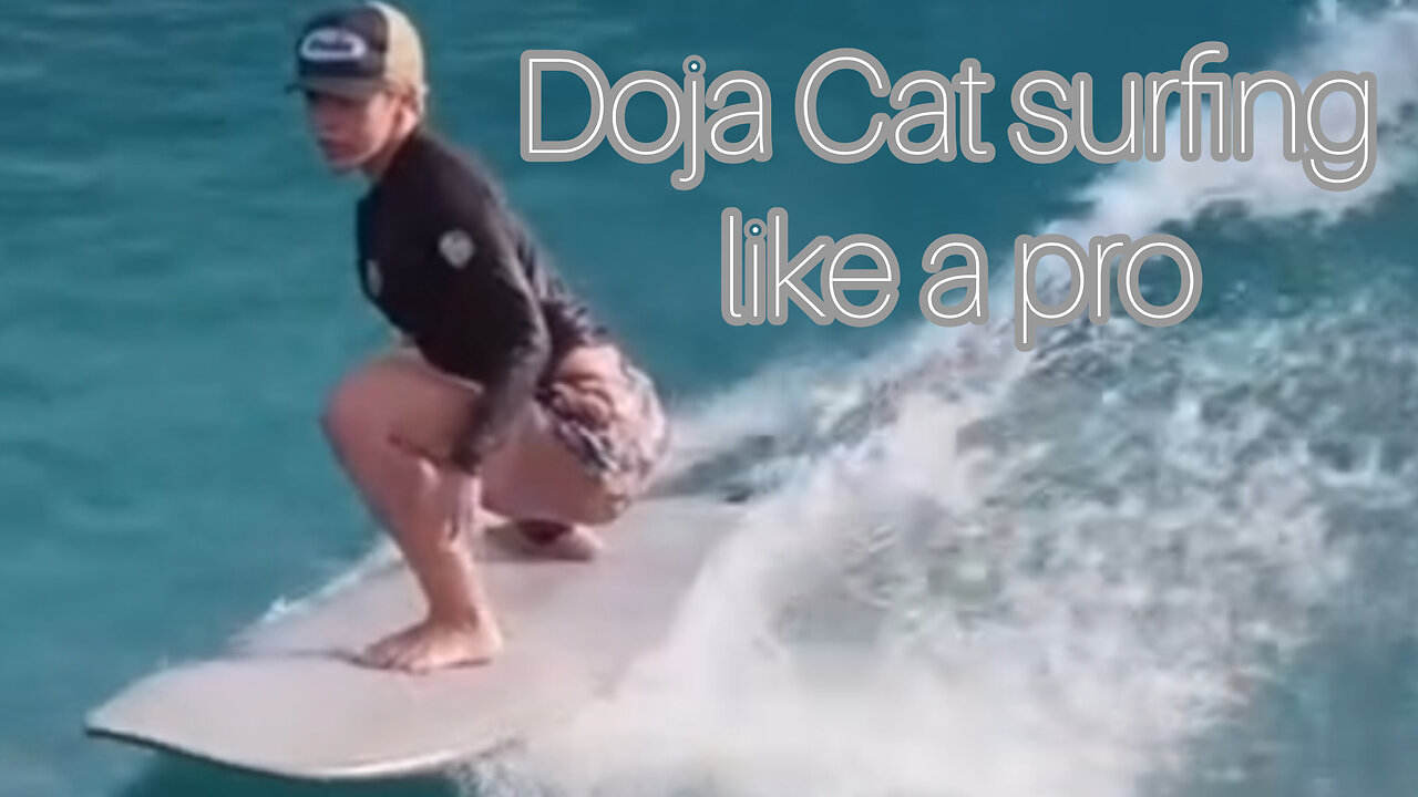 Doja Cat surfing like its a competition