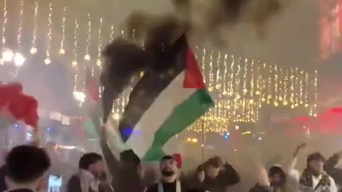BREAKING: At the opening night of the Christmas market in Brussels, masked Islamists set off smoke bombs, attacked families, and waved Palestinian flags.