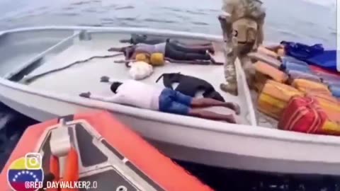 Footage shows U.S. forces in the Caribbean boarding a small boat, detaining three suspects