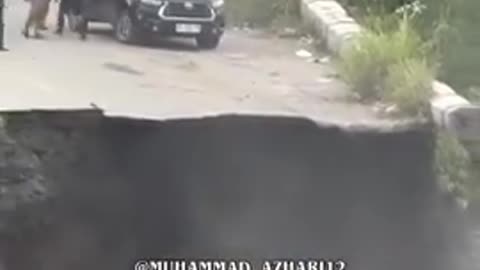 Road on Jalan Pacuan Kuda in Bener Meriah, Aceh, Indonesia collapsed after powerful floods