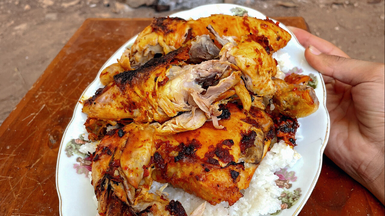 Preparing chicken on charcoal in a relaxing nature