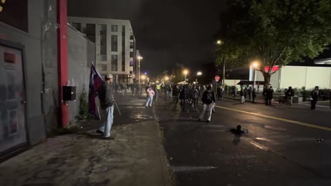 Massive fight outside ICE in Portland, pepper balls fired.