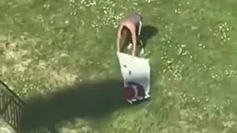 CRANE DRIVER KEEPS MOVING THE CRANE AND BLOCKING THE SUN FROM TANNING WOMAN