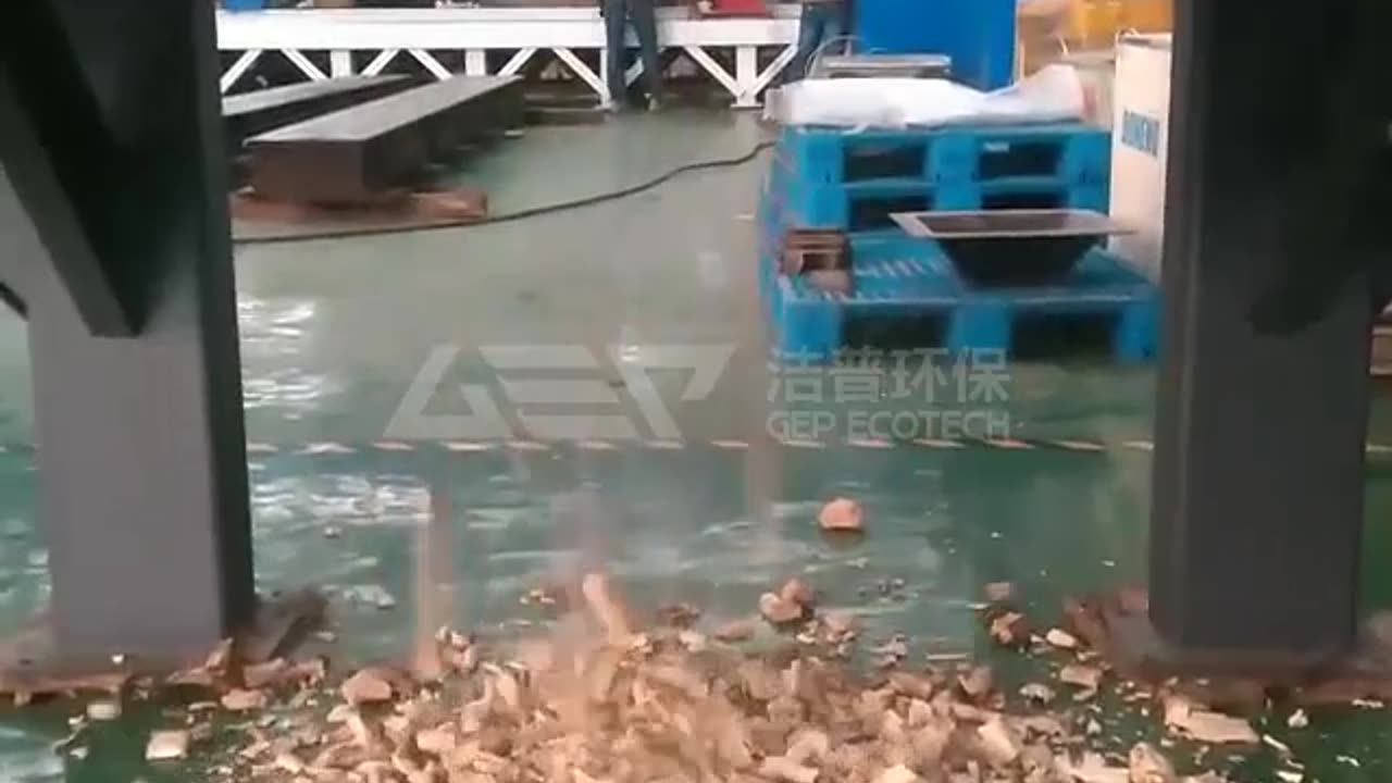 Watch the Powerful Double Shaft Shredder Testing on Wooden Stakes!