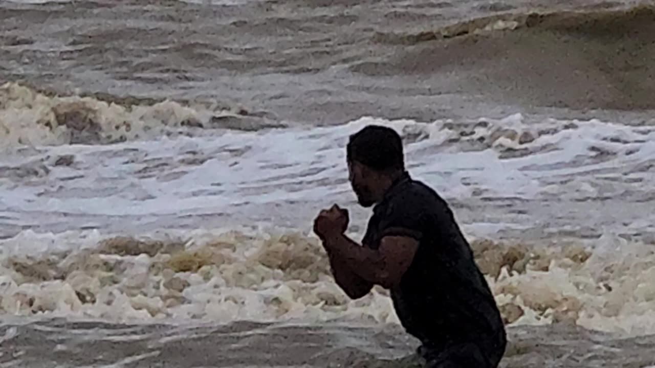 Cox's Bazar Beach with the blue waters and roaring waves of the Bay of Bengal.