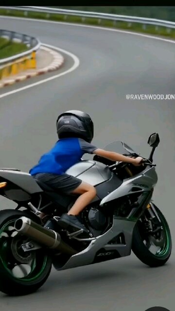 11 year old boy riding a wheelie