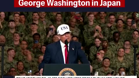 Trump arrives to "God Bless the USA" aboard the USS George Washington in Japan