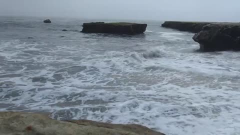 Gray Sky and Crashing Waves