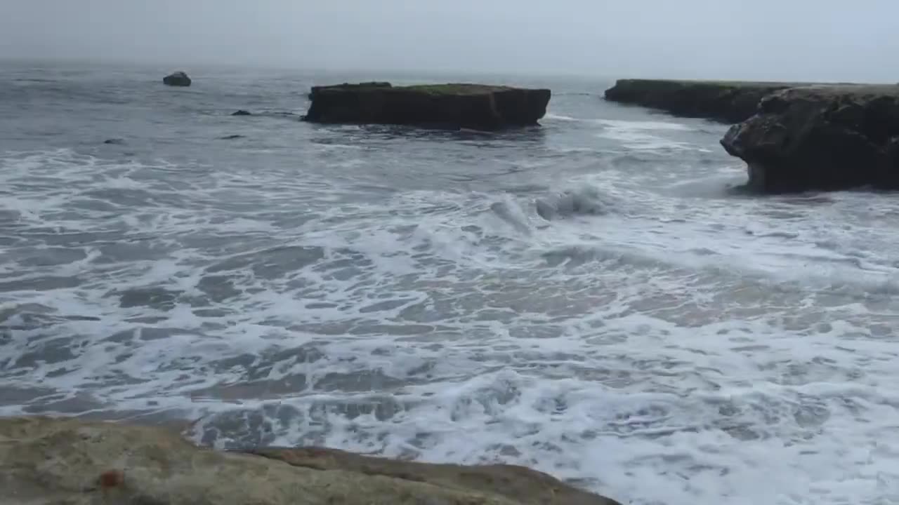 Gray Sky and Crashing Waves