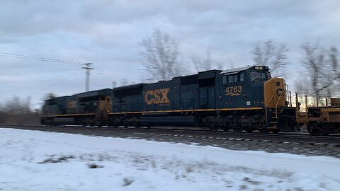 CSX Train engines 3405 and MAC 4763 head East