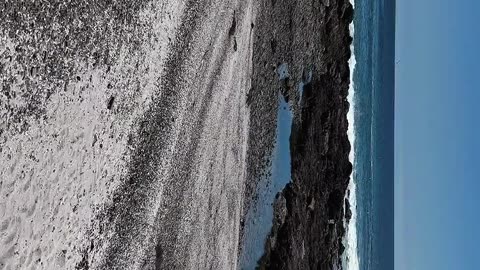 así es playa blanca vista desde el cielo con drone dji mini 4 pro