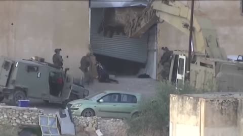 Investigation launched after Israeli forces were filmed killing two Palestinian men
