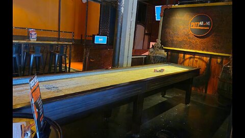 WIFEY AND I PLAYING SHUFFLEBOARD