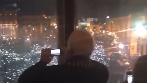 February 2014, Maidan Square, John McCain filming the protests, standing alongside Geo...