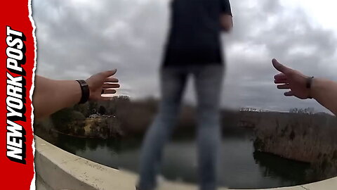 Heart-pounding video captures moment cop stops distraught woman from leaping off bridge the day after Christmas