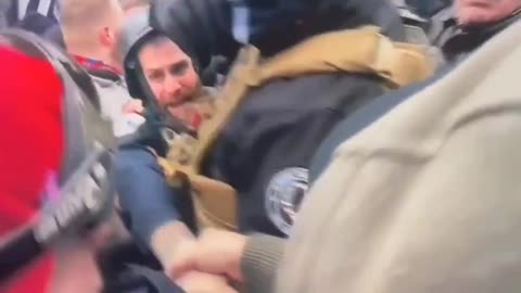 Fanone being saved by J6ers.