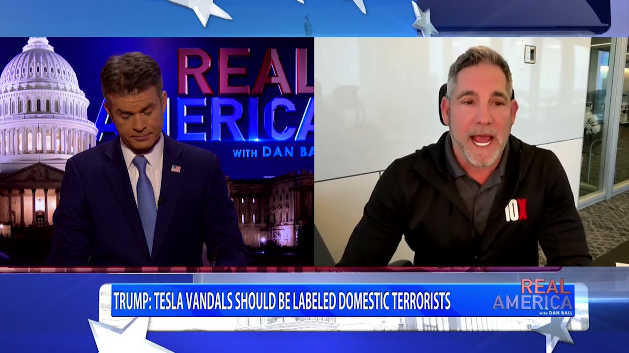 REAL AMERICA -- Dan Ball W/ Grant Cardone, Telsa Terrorism & The Left's New Target, 3/12/25