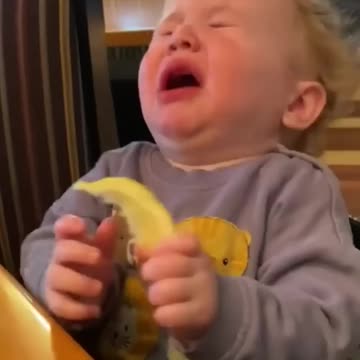 Baby trying to eat lemon first time😋