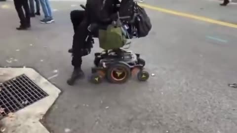 Wheelchair bound ICE rioter instantly healed. Caught on Camera. Minneapolis, Minnesota