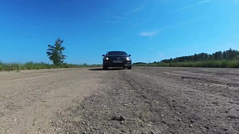 Man Climbs on His Car While Driving