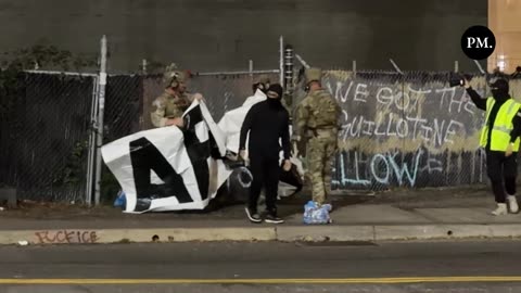 Federal agents just seized rioters "Abolish ICE" sign outside the ICE facility in Portland.